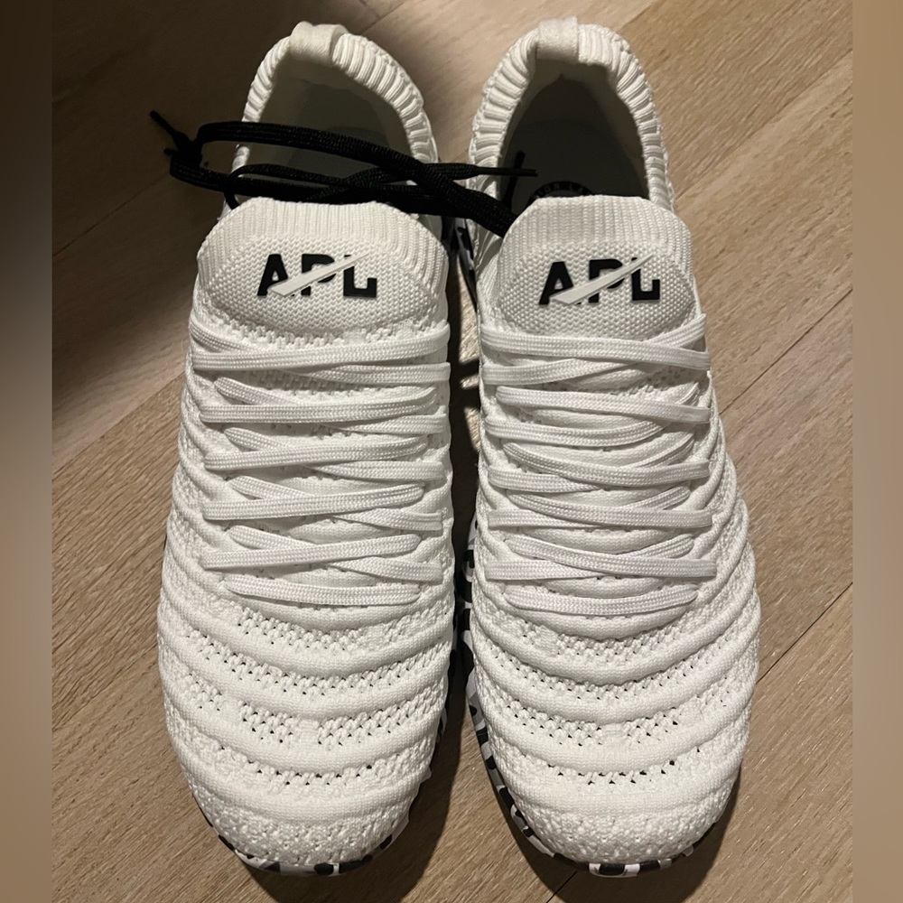 APL new womens 8.5 sneaker white with black leopard sole